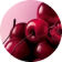 Un tas de cerises brillantes, rouge fonce a noir, remplit le bas et la droite du cadre, sur un fond rose doux.