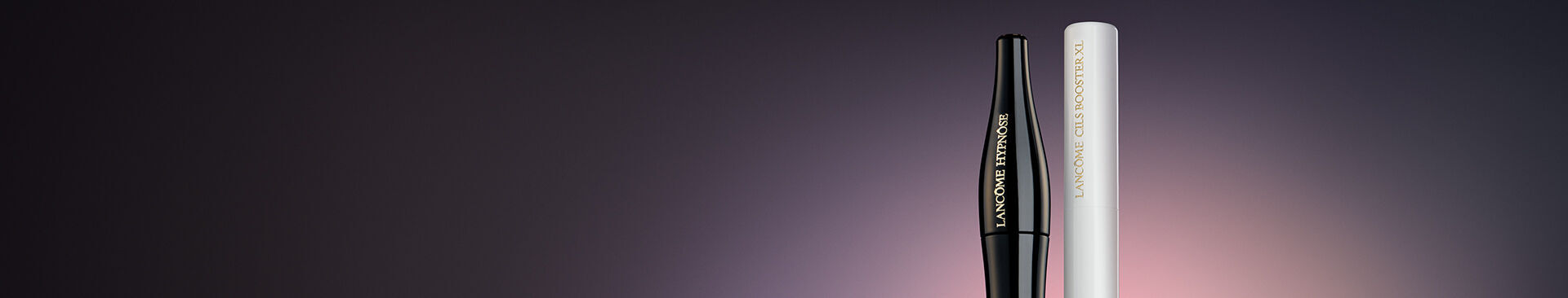 Two mascara tubes are displayed against a gradient background: one black labeled "Lancome Hypnose" and one white labeled "Lancome Cils Booster XL."