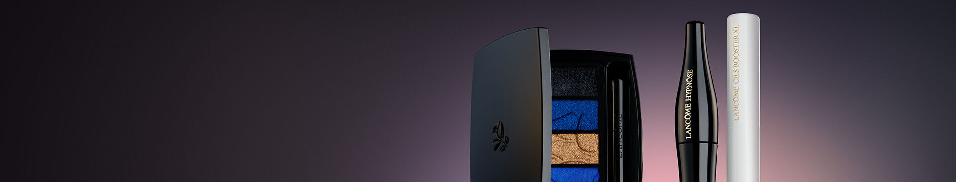 A stylish arrangement of a black eyeshadow palette featuring blue and gold shades, alongside a black eyeliner and a white mascara tube, set against a gradient background.