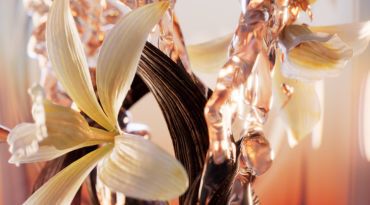 A close-up of delicate white flowers intertwined with metallic strands, creating a visually striking blend of natural and abstract elements. The background features soft gradients of light, enhancing the composition's elegance.